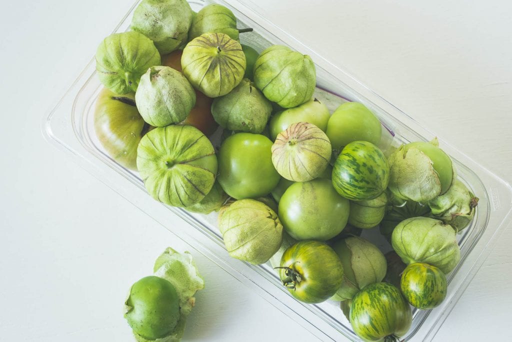 Tomatillos and tomatoes.