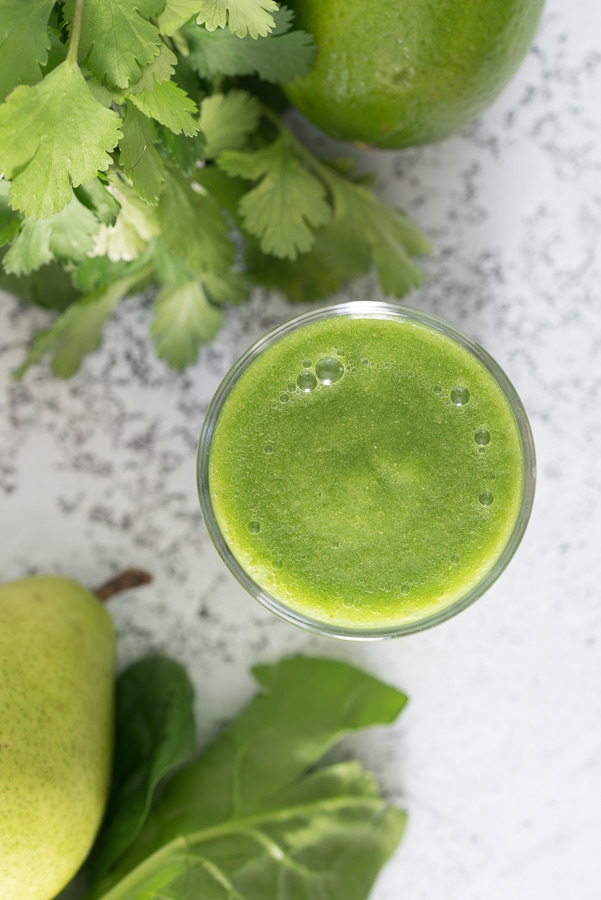 Glass of pear juice with spinach.